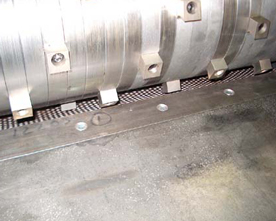 Rotor shaft with replaceable cutter inserts