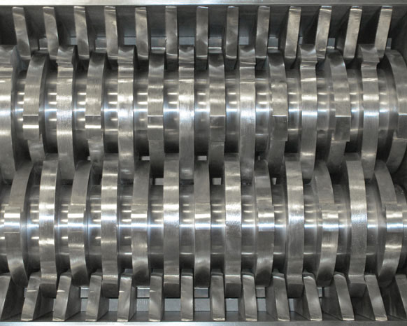 Shredder Cuts Scrap Size, Volume